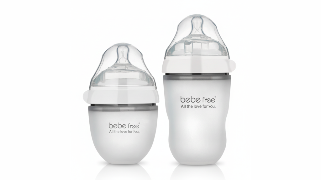 Silicone baby bottle with nipple and cap